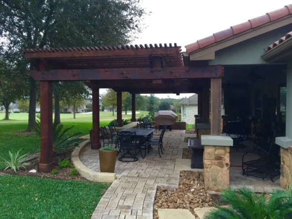 Texas outdoor patio design with custom wood pergola