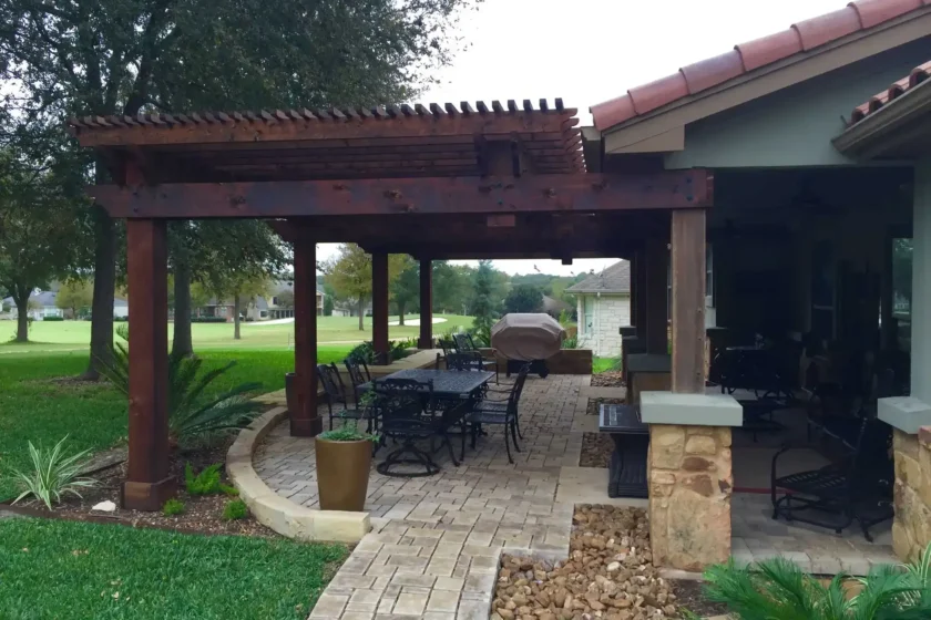 Texas outdoor patio design with custom wood pergola