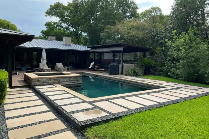 luxury pool modern landscape design in lakeway backyard