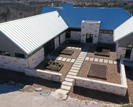 Native xeriscape courtyard and retaining wall